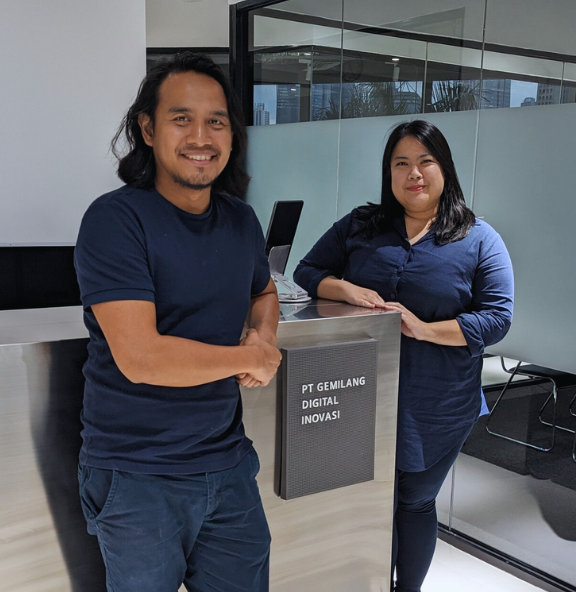 Innovate 62 Staff standing in front of the office reception desk